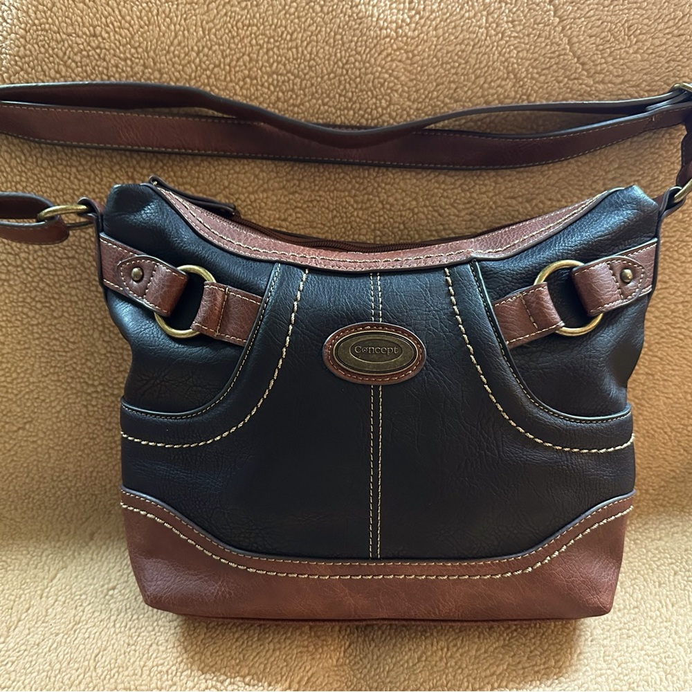 NWT Concept Crossbody Shoulder bag. Black and Brown/saddle purse.